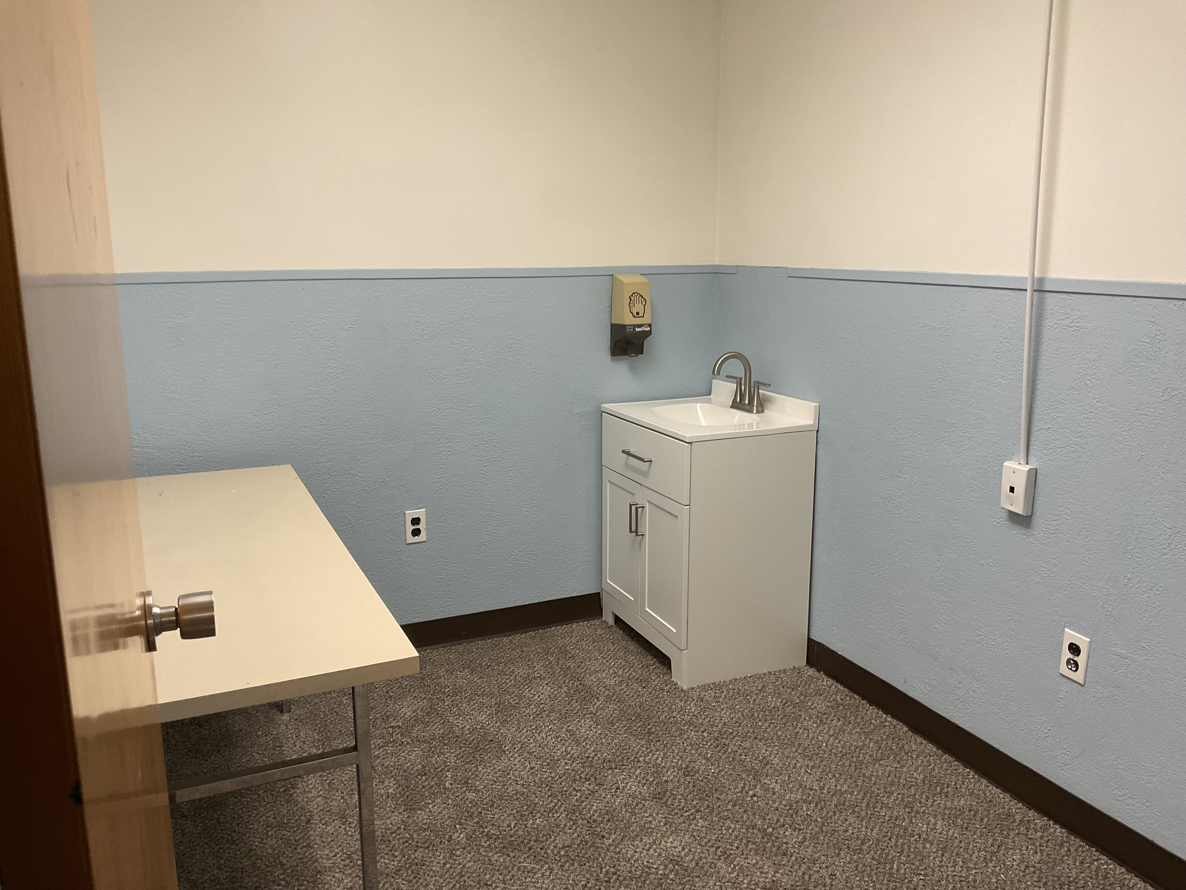 Private treatment suite with luxury plank vinyl flooring