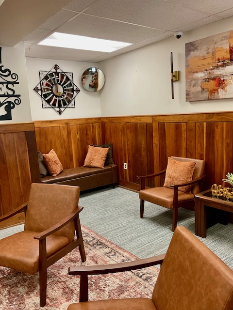 Cozy waiting nook with leather bench and seating